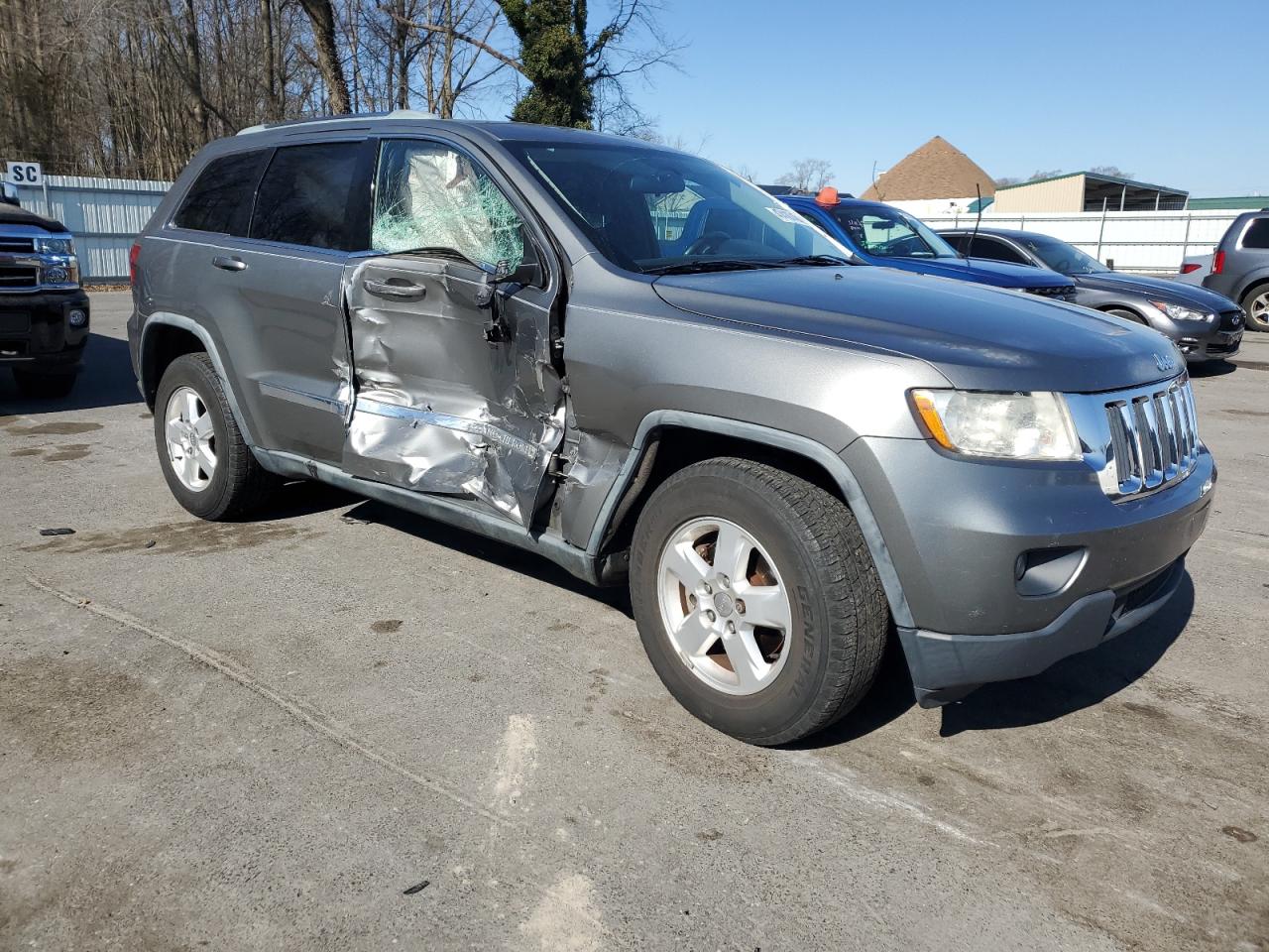2011 Jeep Grand Cherokee VIN 1J4RR4GG4BC576872 Copart auction photo, side damage thumbnail 4