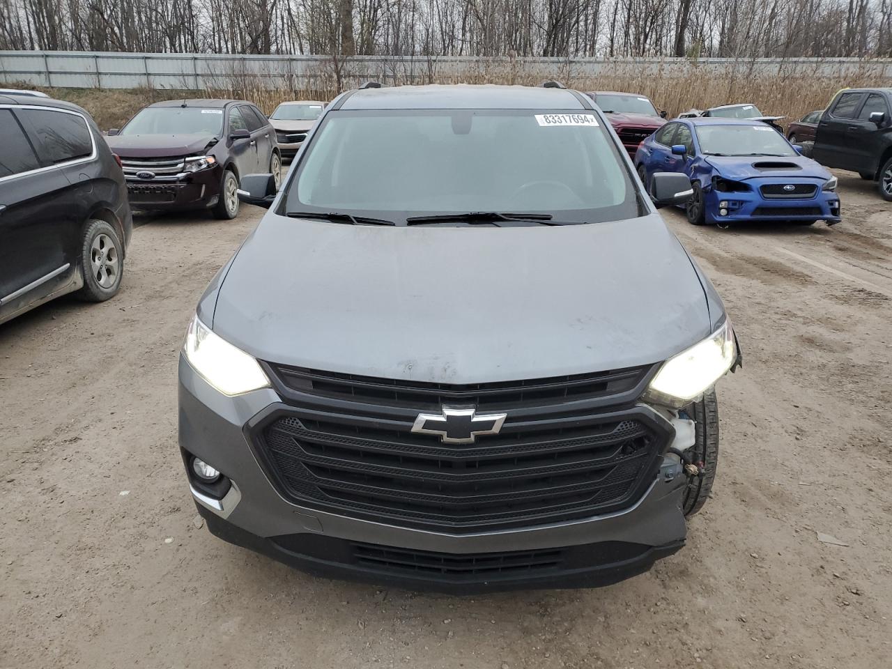 2018 Chevrolet Traverse VIN 1GNERGKW8JJ141438 Copart auction photo, front end / side damage thumbnail 5