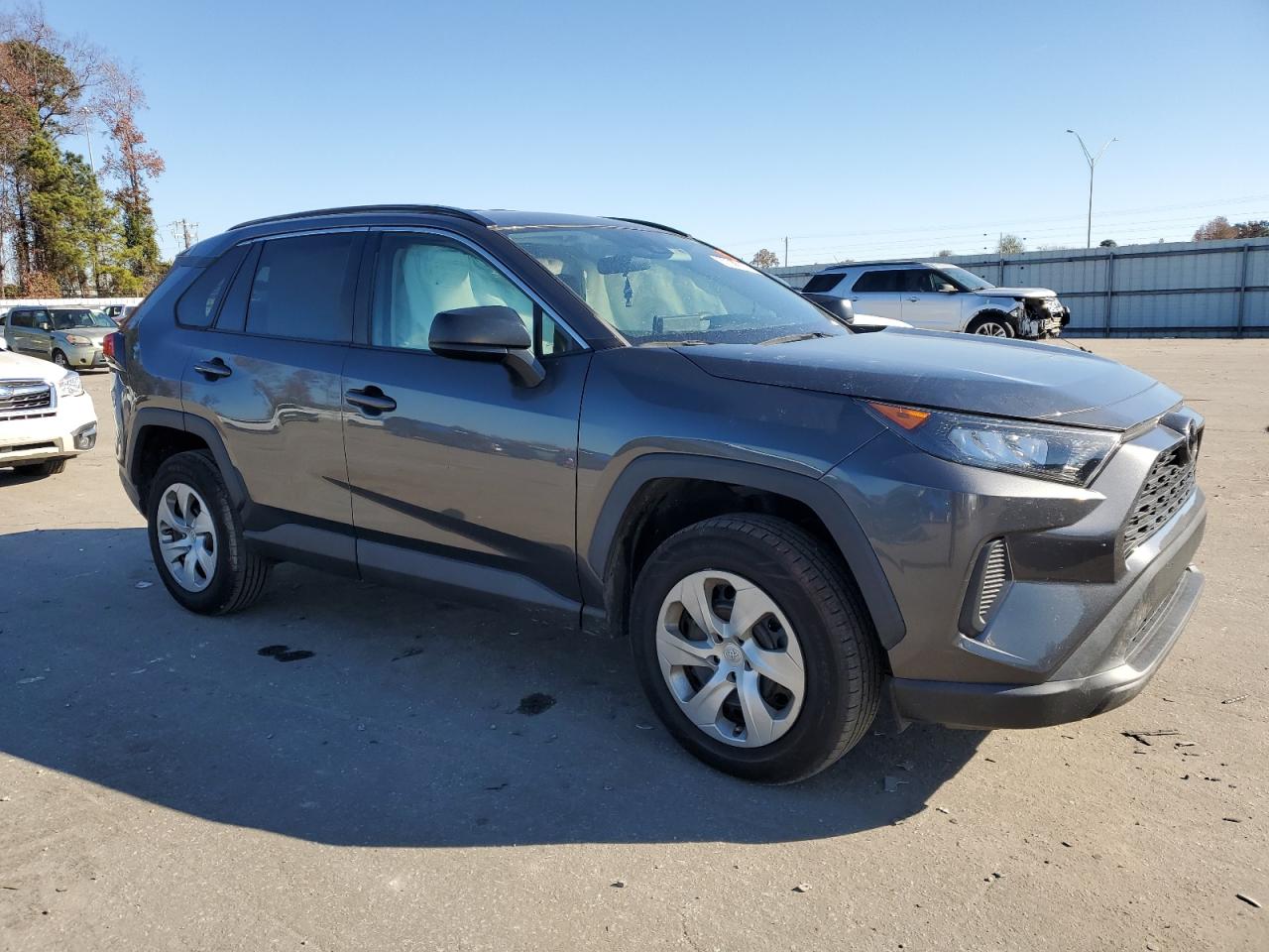2020 Toyota RAV 4 VIN 2T3H1RFV5LC049977 Copart auction photo, side damage thumbnail 4