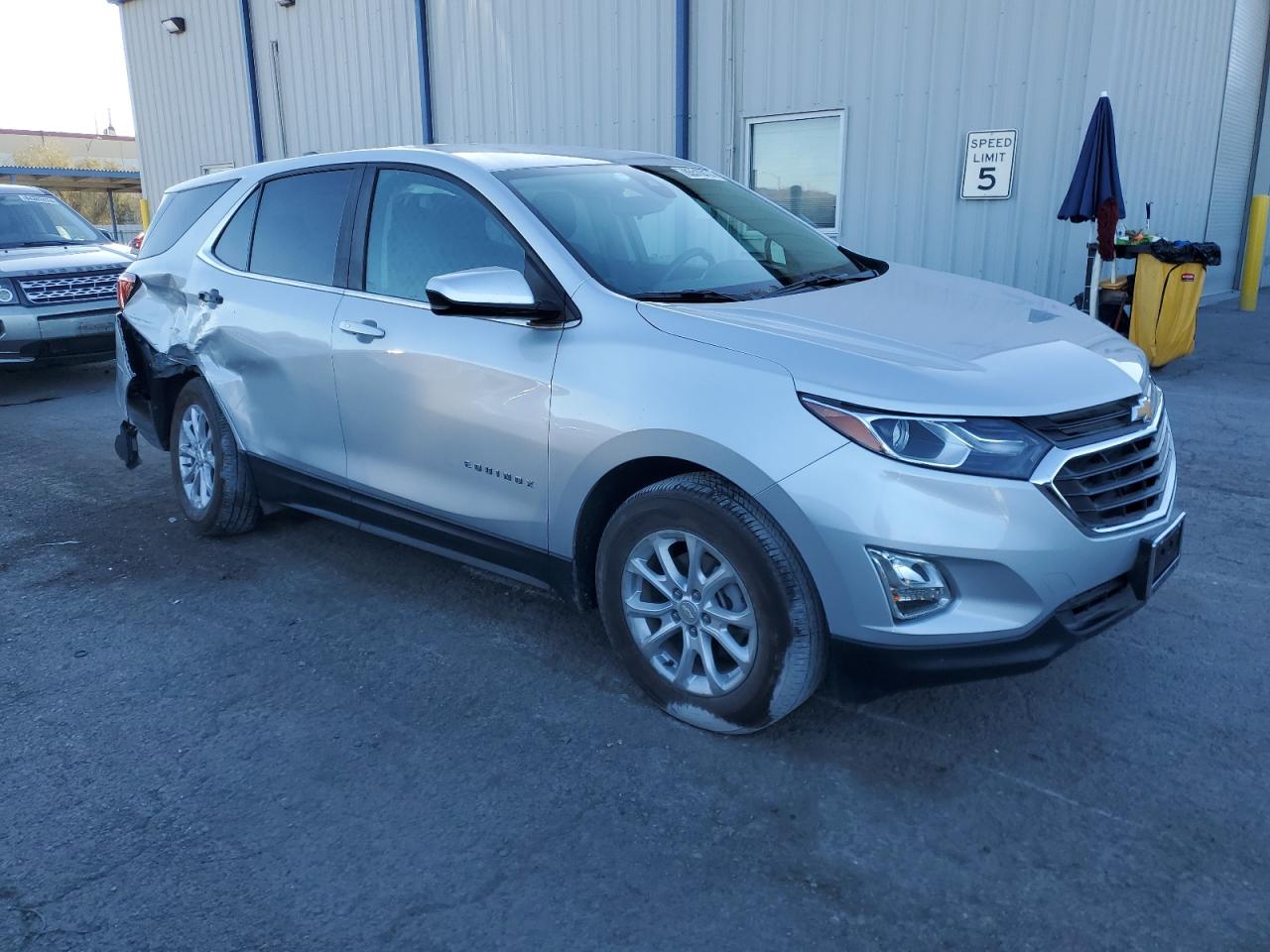 2021 Chevrolet Equinox VIN 3GNAXKEV0MS130009 Copart auction photo, rear end / side damage thumbnail 4
