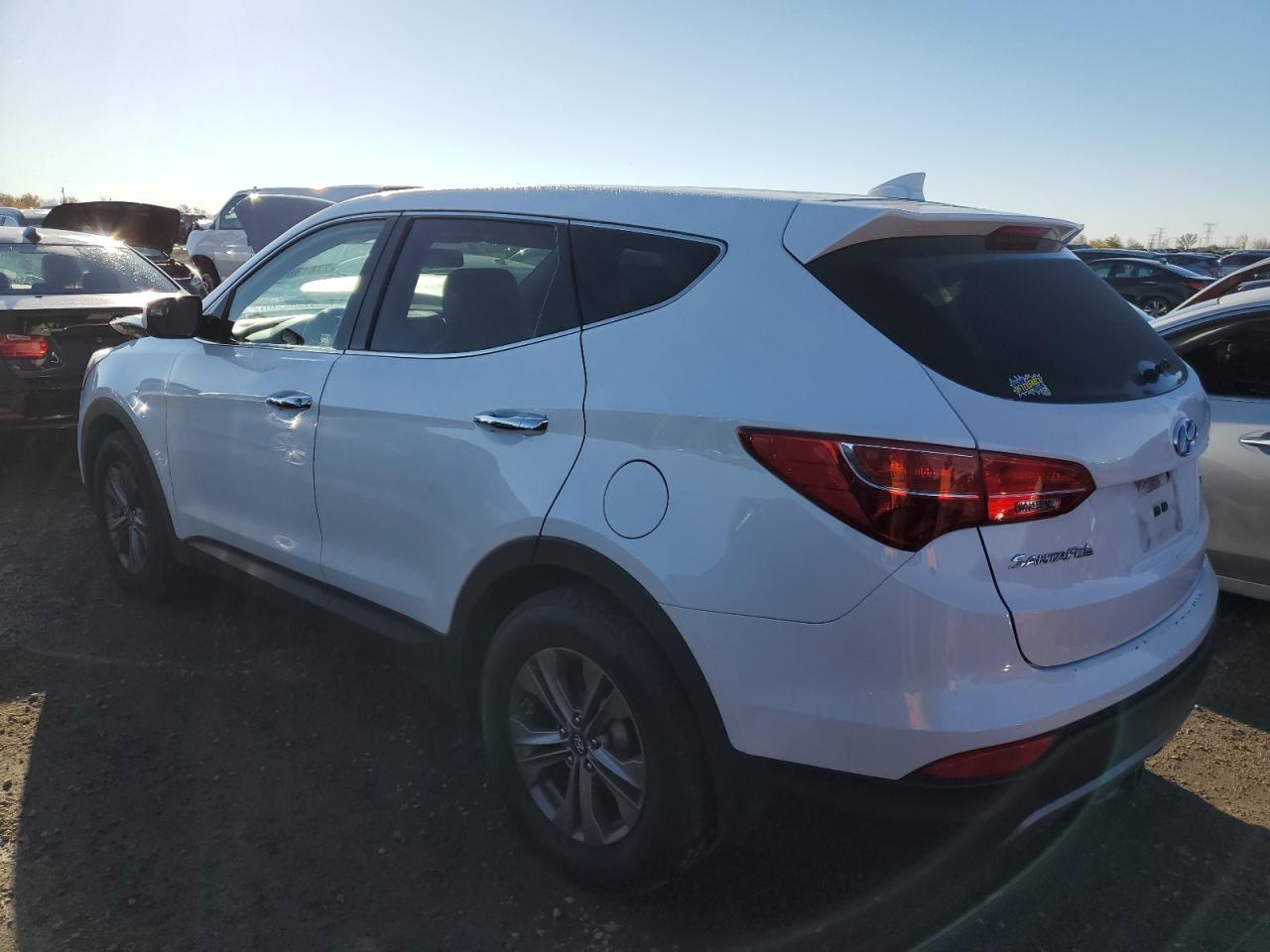 2016 Hyundai Santa Fe VIN 5XYZTDLB8GG344747 Copart auction photo, front end / minor dent/scratches damage thumbnail 2