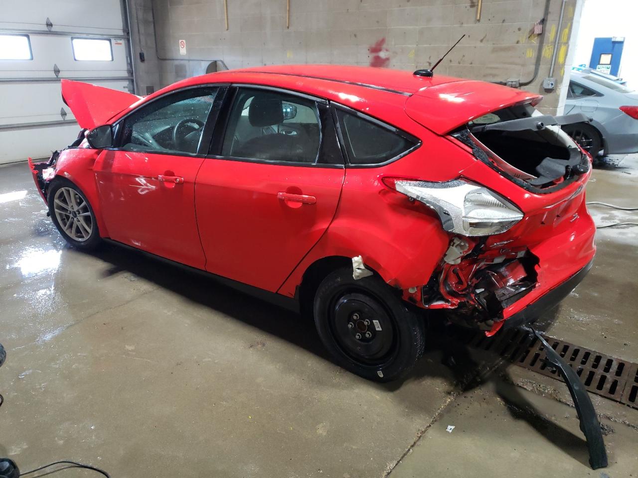 2015 Ford Focus VIN 1FADP3K2XFL357616 Copart auction photo, front end / rear end damage thumbnail 2