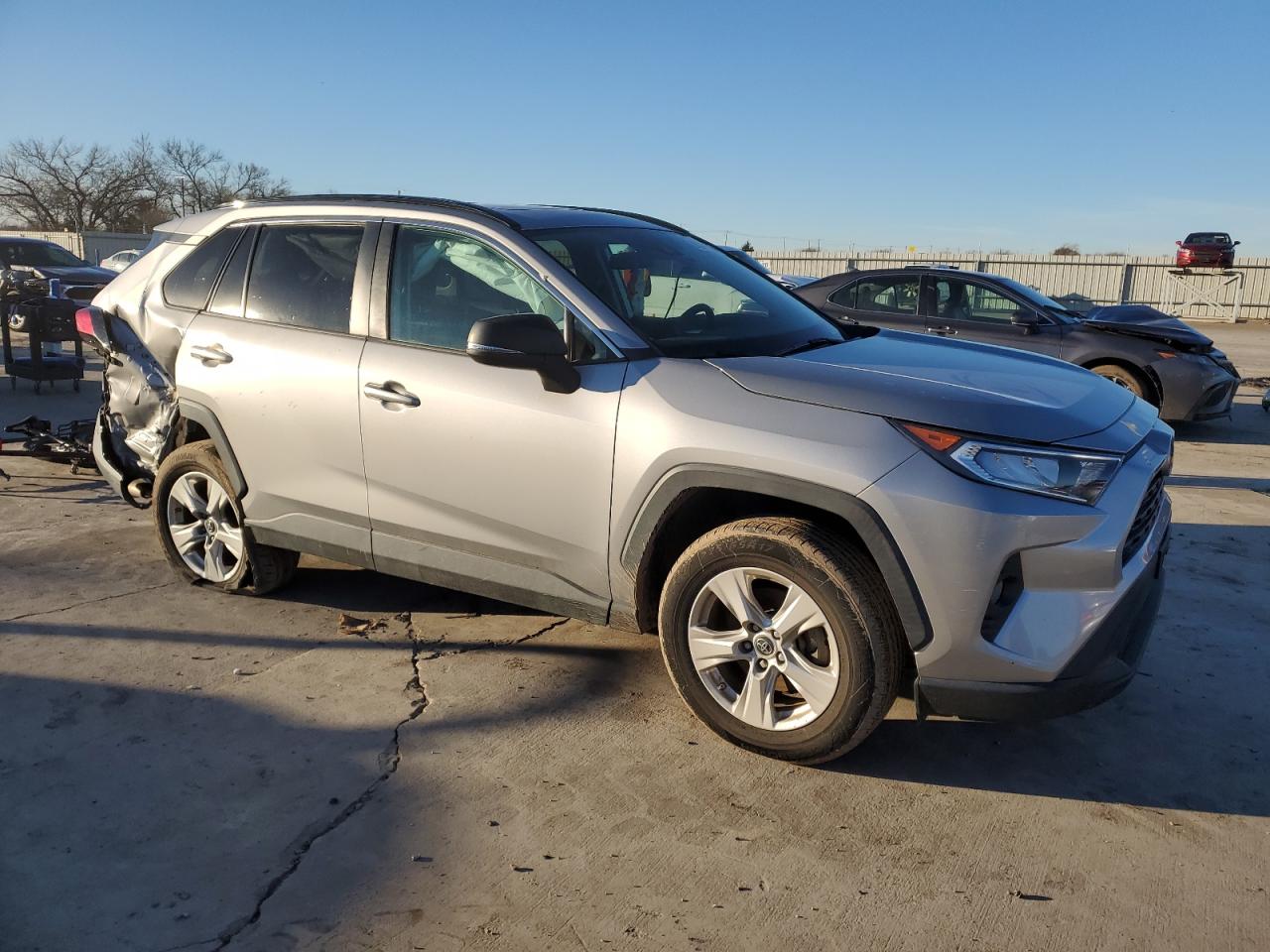 2019 Toyota RAV 4 VIN 2T3W1RFV0KW032220 Copart auction photo, rear end damage thumbnail 4