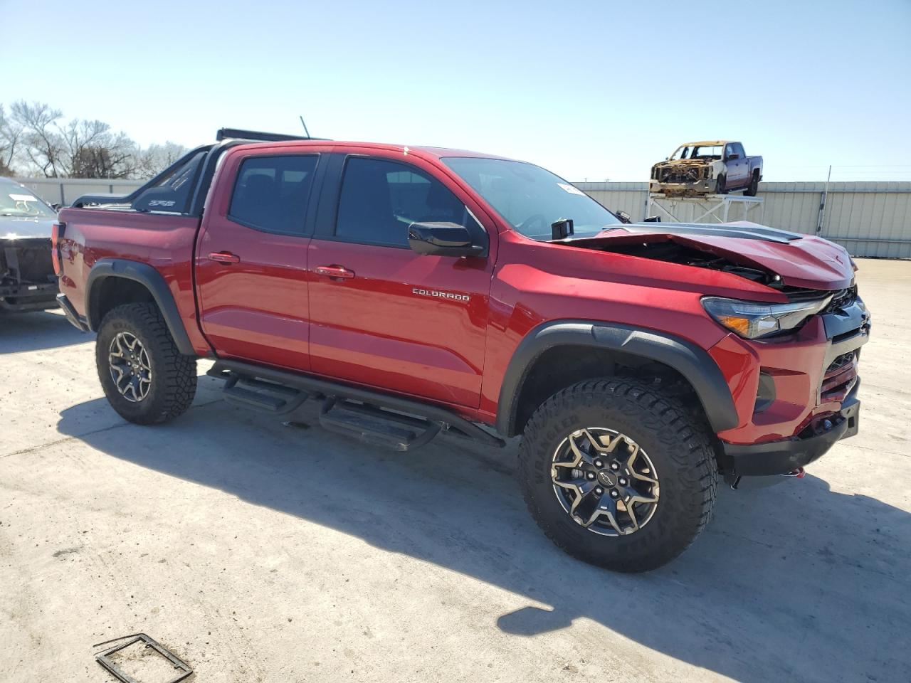 2024 Chevrolet Colorado VIN 1GCPTFEK5R1275826 Copart auction photo, front end / hail damage thumbnail 4