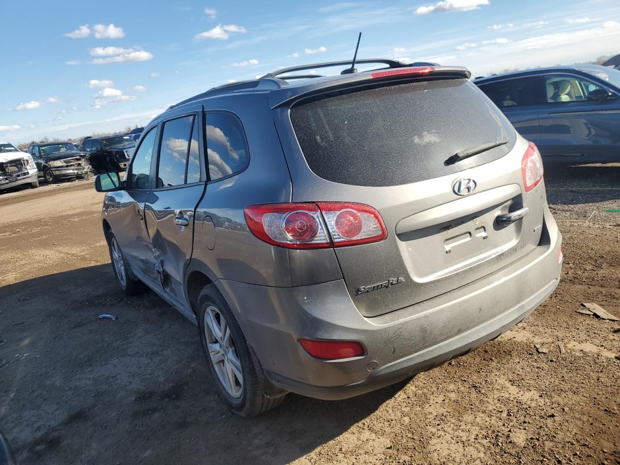 2012 Hyundai Santa Fe VIN 5XYZK4AG5CG147921 Copart auction photo, side damage thumbnail 2