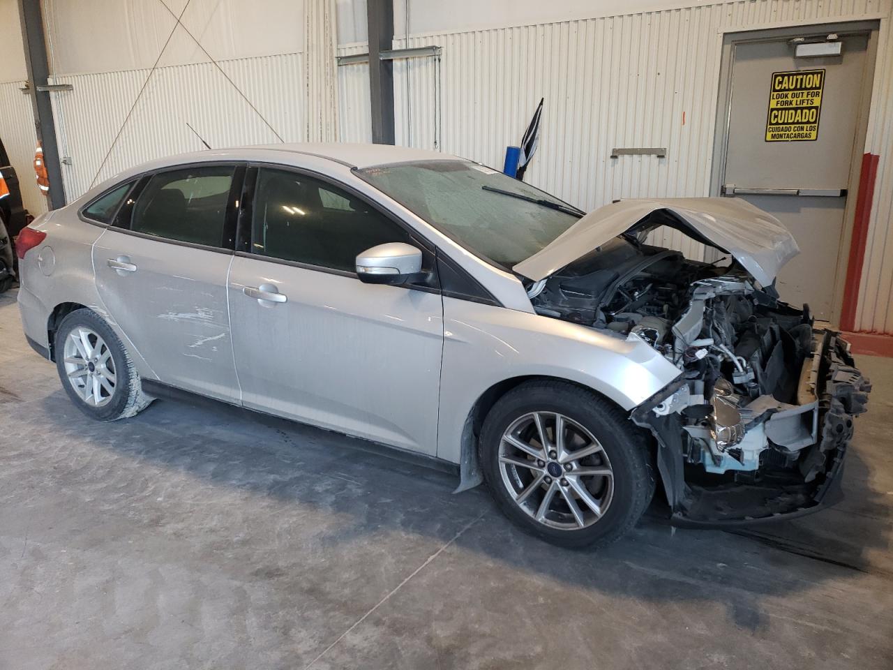 2016 Ford Focus VIN 1FADP3F23GL348722 Copart auction photo, all over damage thumbnail 4
