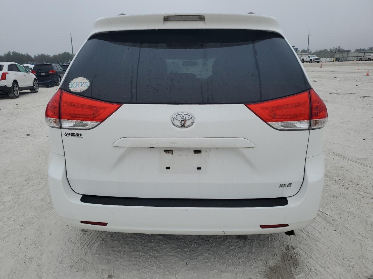 2014 Toyota Sienna VIN 5TDYK3DC7ES437808 Copart auction photo, front end damage thumbnail 6