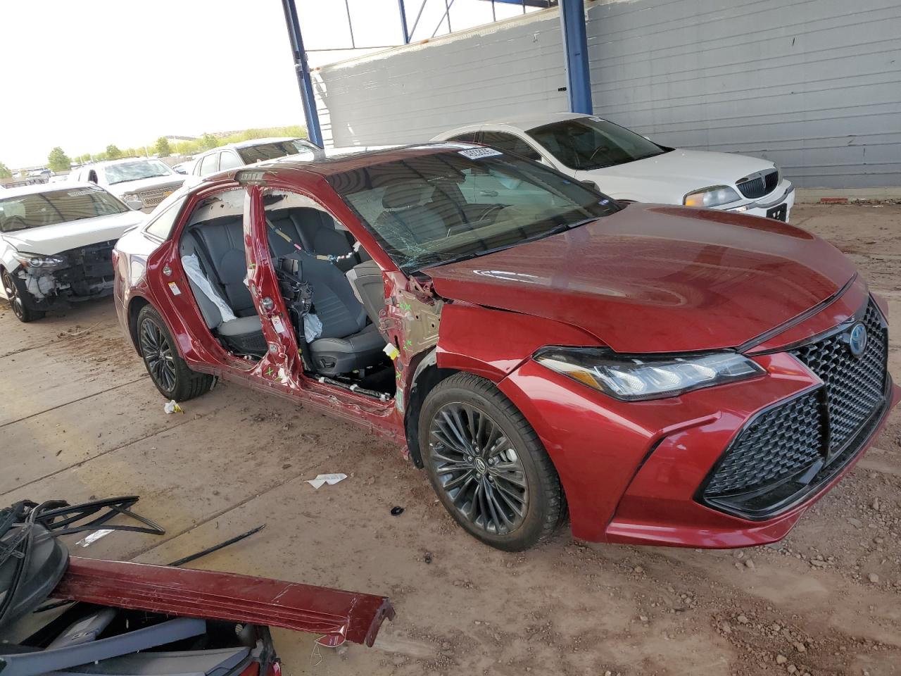 2019 Toyota Avalon VIN 4T1B21FB8KU009053 Copart auction photo, side / front end damage thumbnail 4