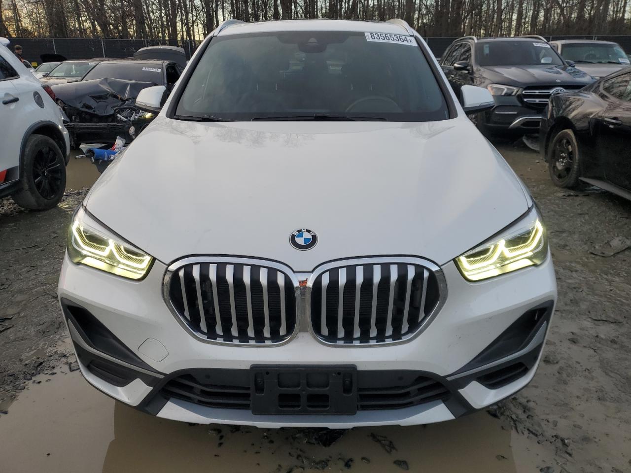 2021 BMW X1 VIN WBXJG7C01M5U26960 Copart auction photo, rear end damage thumbnail 5
