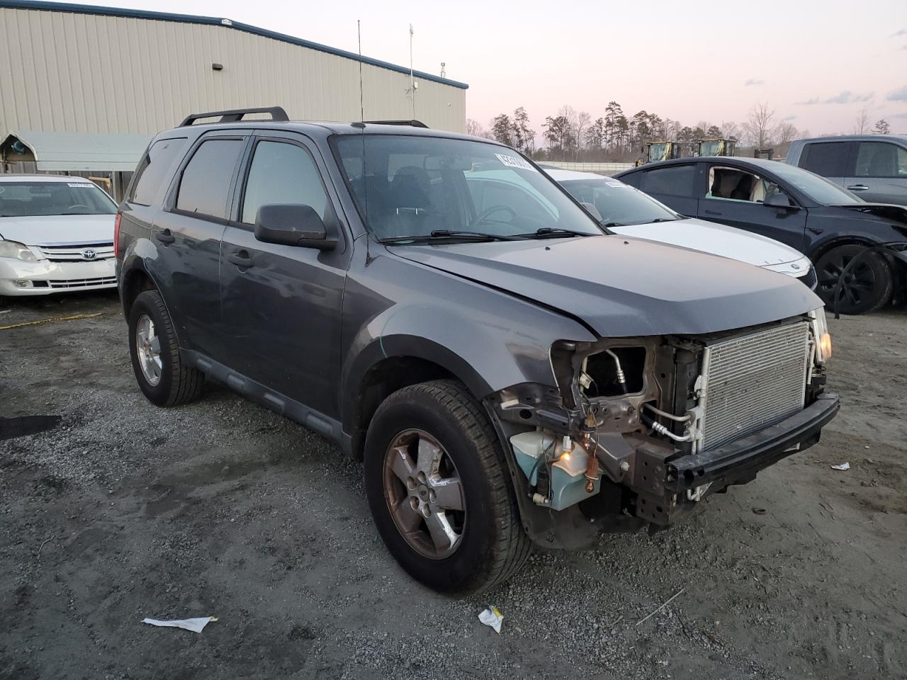 2011 Ford Escape VIN 1FMCU0DG5BKA72324 Copart auction photo, front end damage thumbnail 4