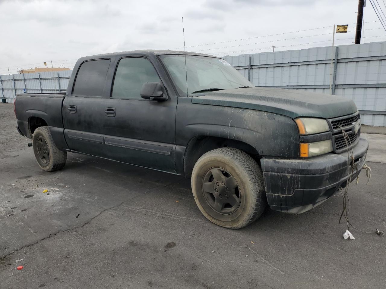 2006 Chevrolet Silverado VIN 2GCEK13T061209392 Copart auction photo, vandalism / front end damage thumbnail 4