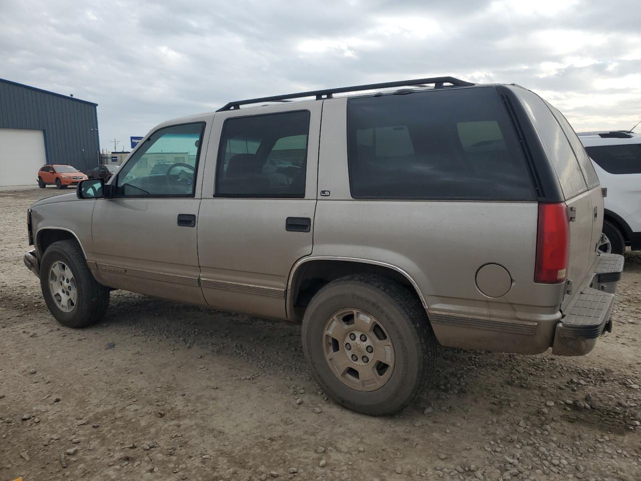 1999 Chevrolet Tahoe VIN 1GNEK13R7XJ321027 Copart auction photo, front end damage thumbnail 2
