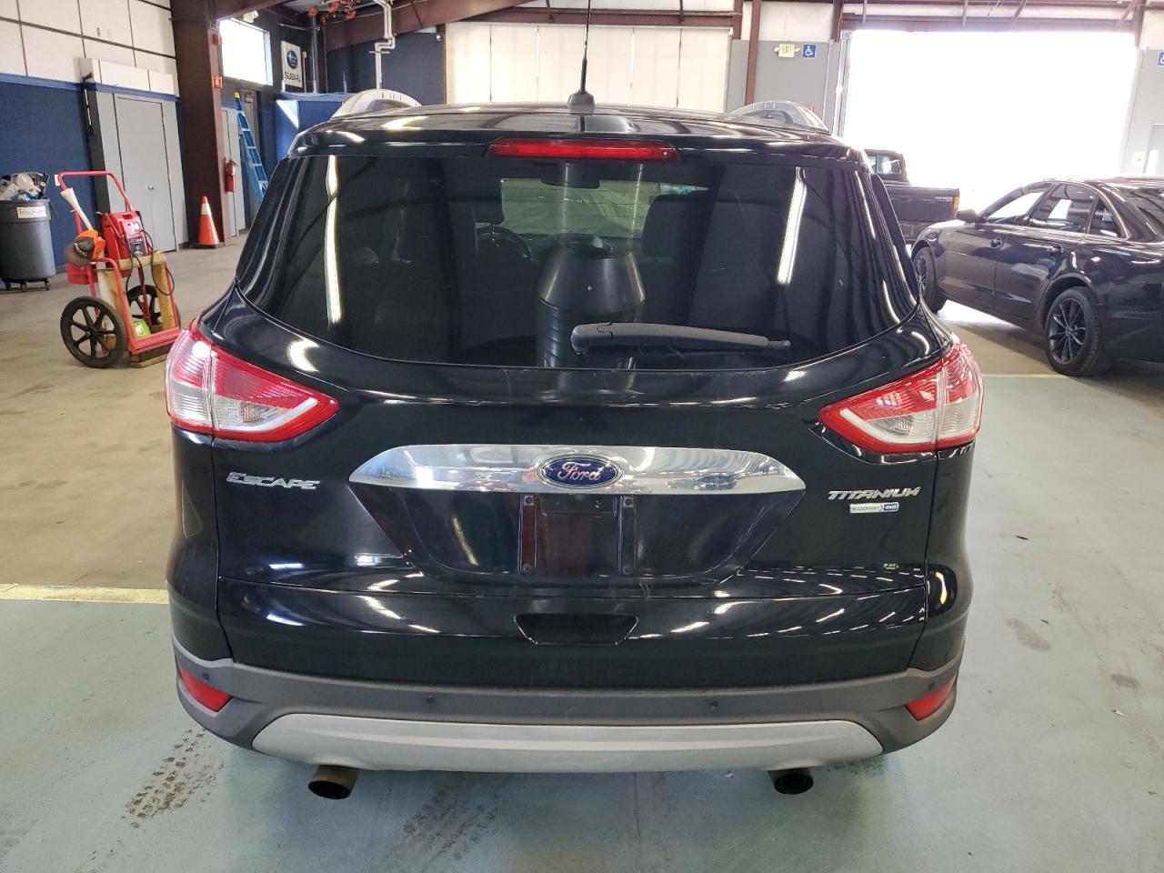 2016 Ford Escape VIN 1FMCU9JX6GUA89458 Copart auction photo, side / minor dent/scratches damage thumbnail 6