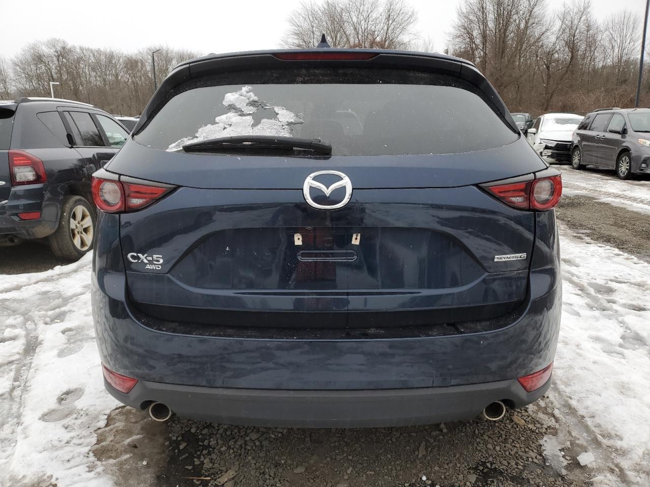 2021 Mazda CX-5 VIN JM3KFBDMXM0360079 Copart auction photo, front end / minor dent/scratches damage thumbnail 6