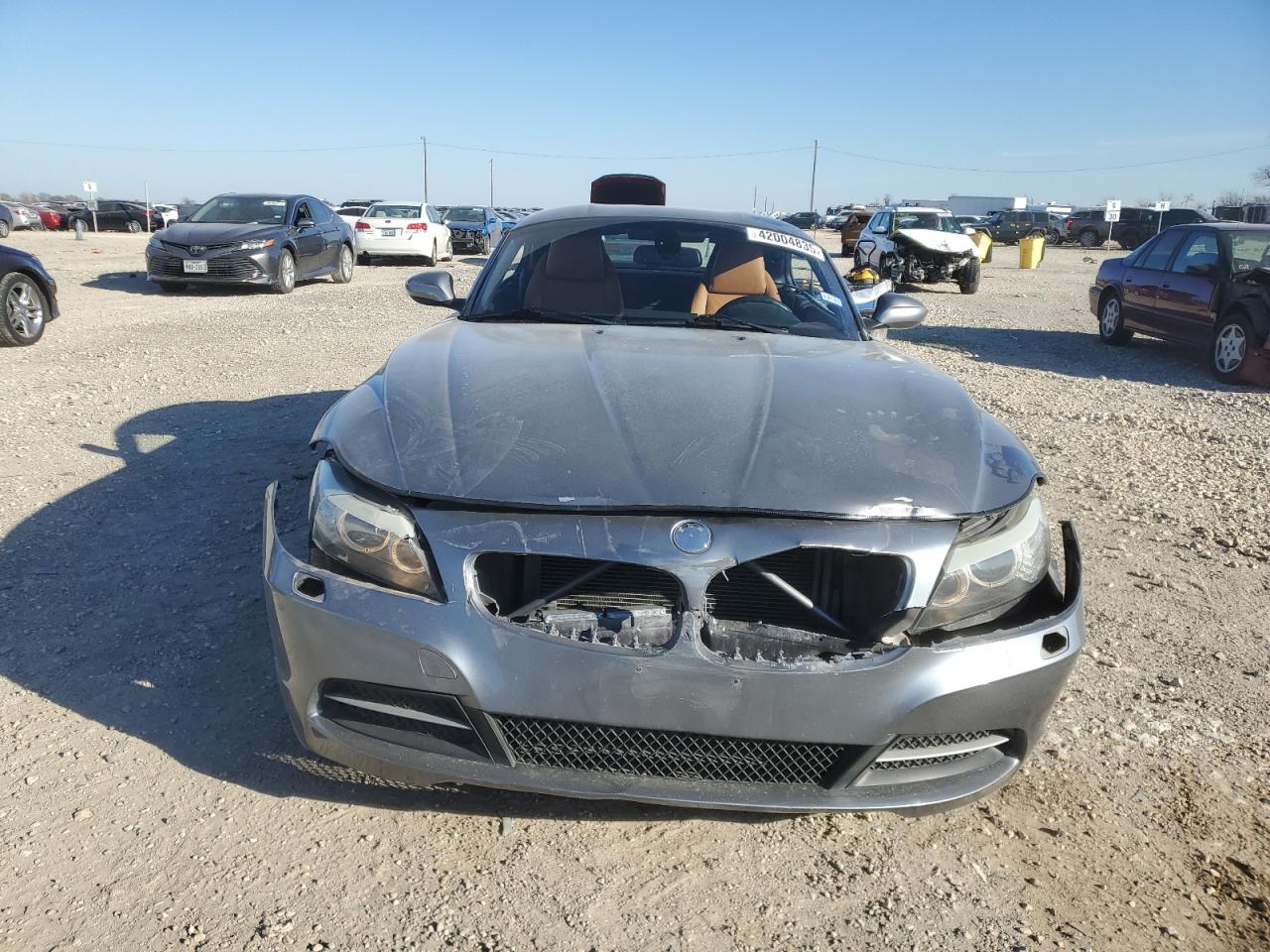 2011 BMW Z4 VIN WBALM5C53BE380525 Copart auction photo, front end damage thumbnail 5