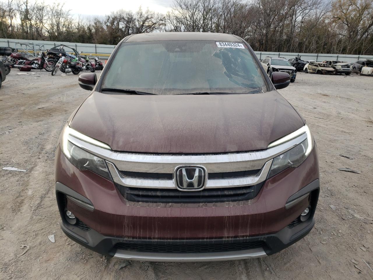 2021 Honda Pilot VIN 5FNYF5H51MB039671 Copart auction photo, undercarriage / minor dent/scratches damage thumbnail 5
