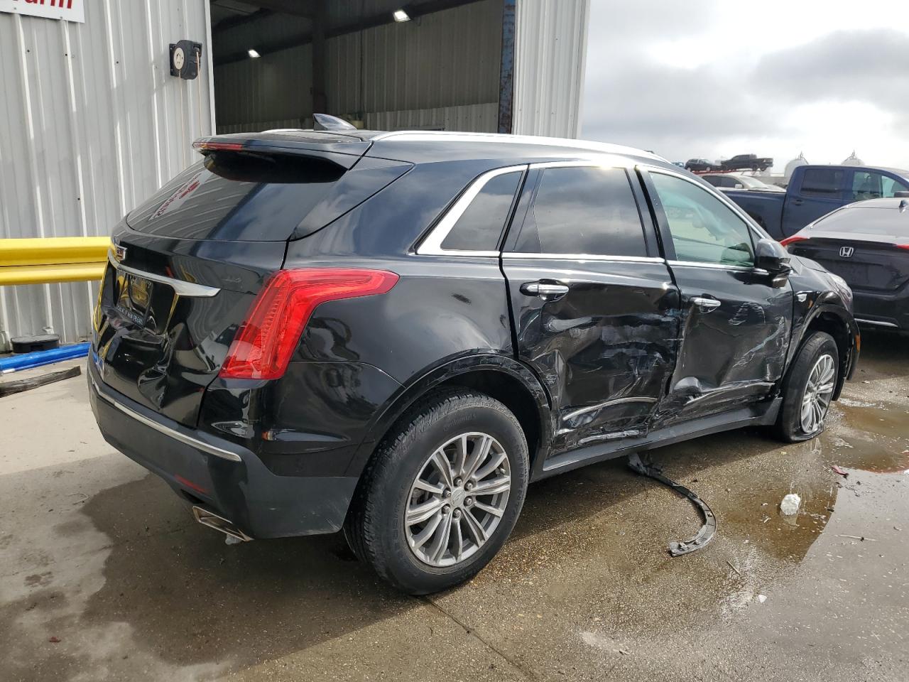 2019 Cadillac XT5 VIN 1GYKNCRS6KZ265191 Copart auction photo, side / front end damage thumbnail 3