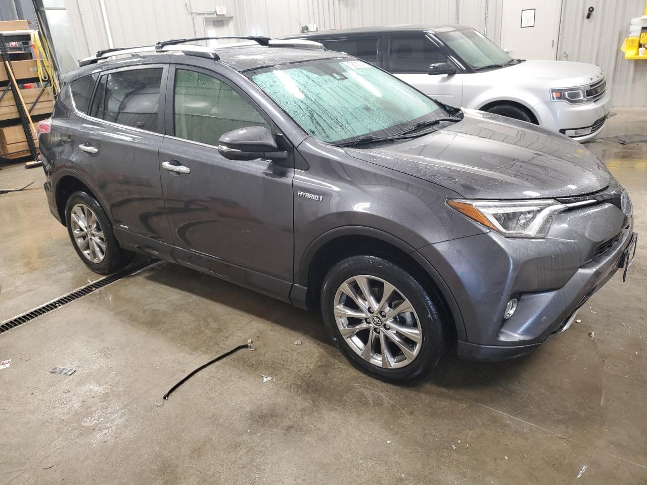 2016 Toyota RAV 4 VIN JTMDJREV4GD005373 Copart auction photo, side / front end damage thumbnail 4