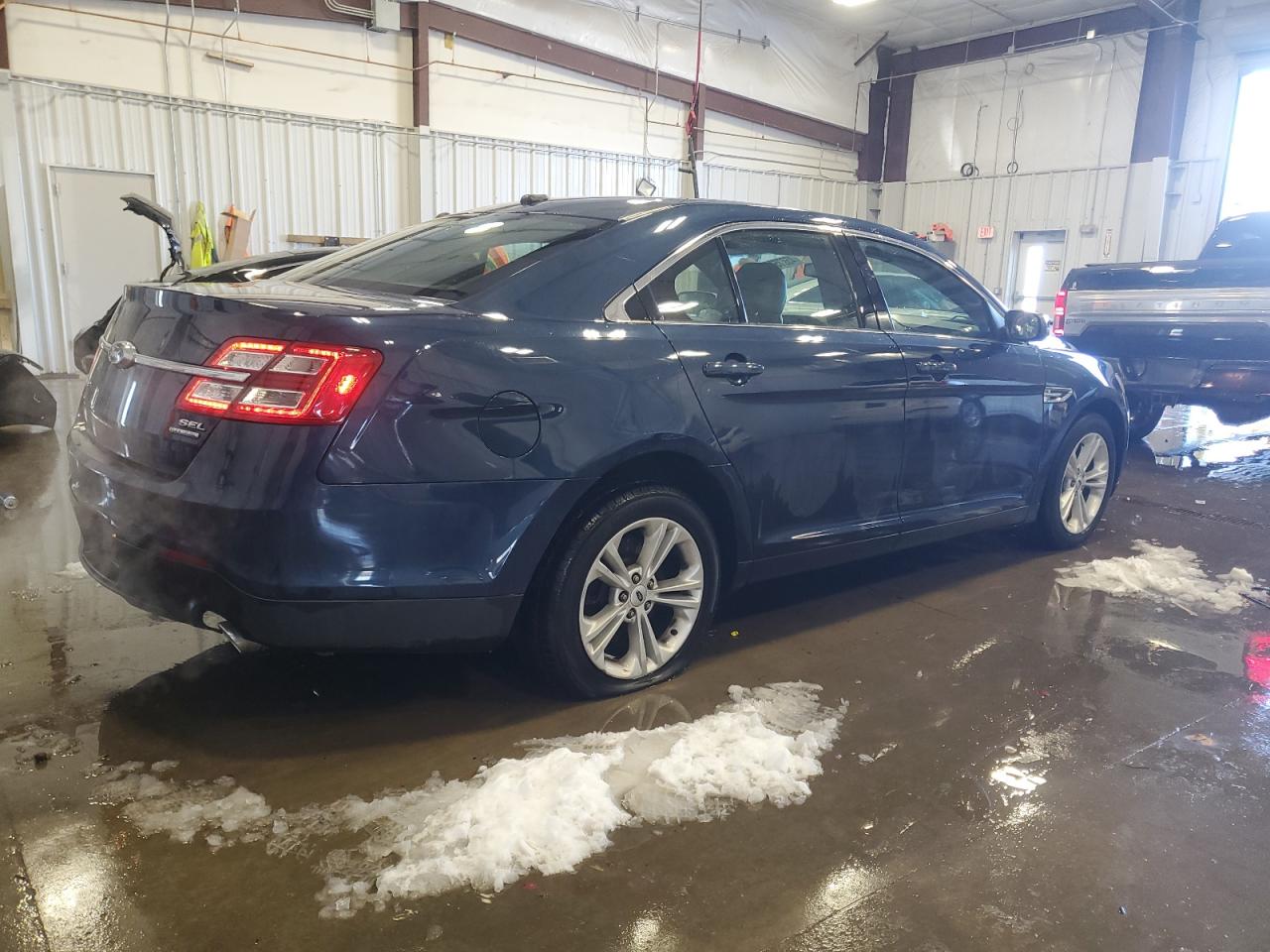 2017 Ford Taurus VIN 1FAHP2E85HG138814 Copart auction photo, side / rear end damage thumbnail 3