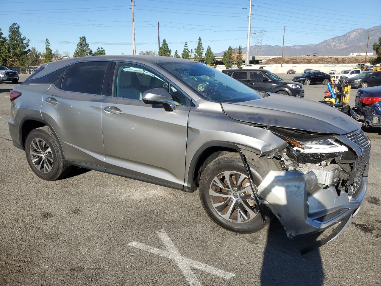 2022 Lexus RX VIN 2T2AZMAA3NC249281 Copart auction photo, front end / side damage thumbnail 4
