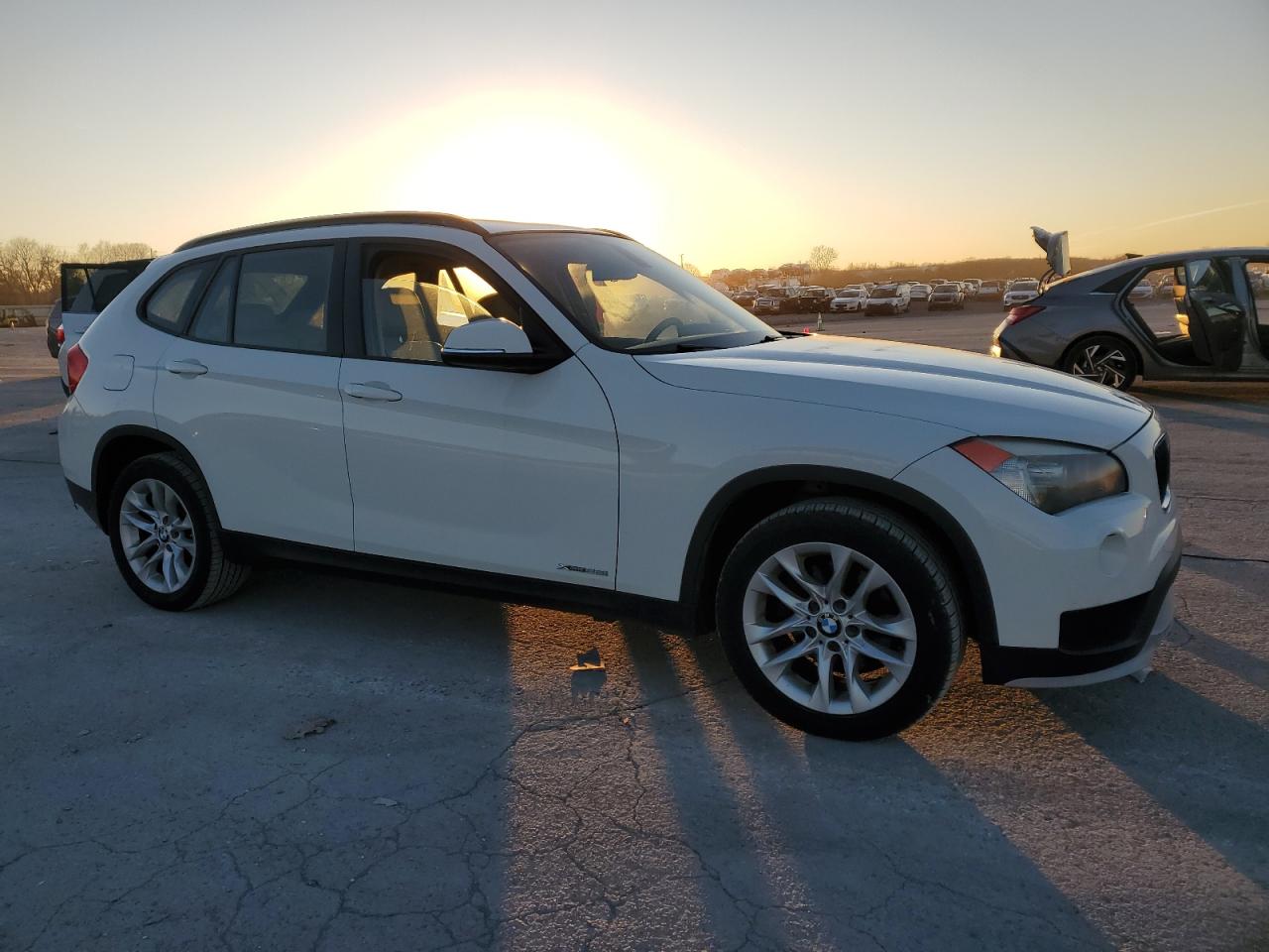 2015 BMW X1 VIN WBAVL1C50FVY31078 Copart auction photo, rear end damage thumbnail 4