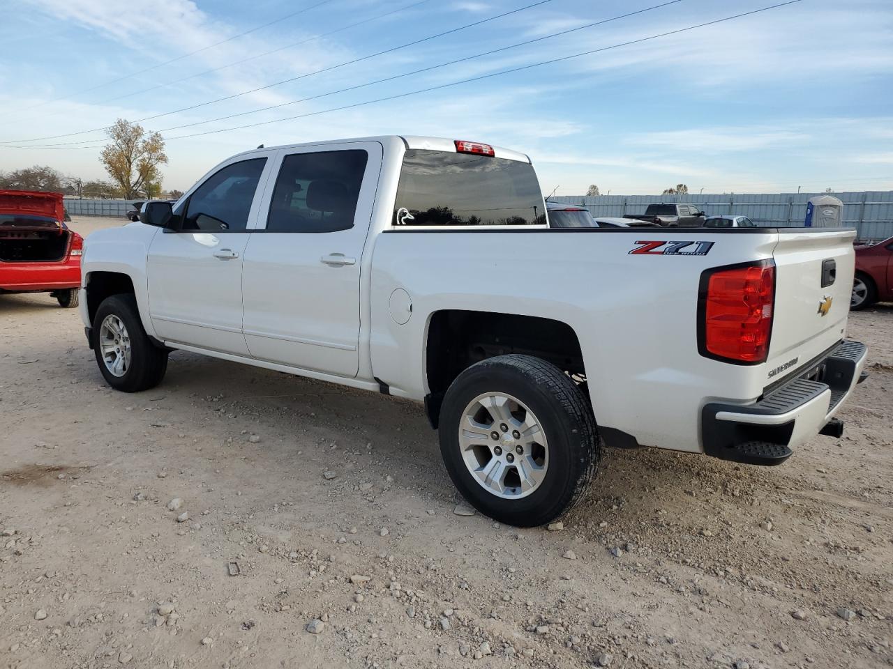 2018 Chevrolet Silverado VIN 3GCUKREC7JG169111 Copart auction photo, hail / minor dent/scratches damage thumbnail 2