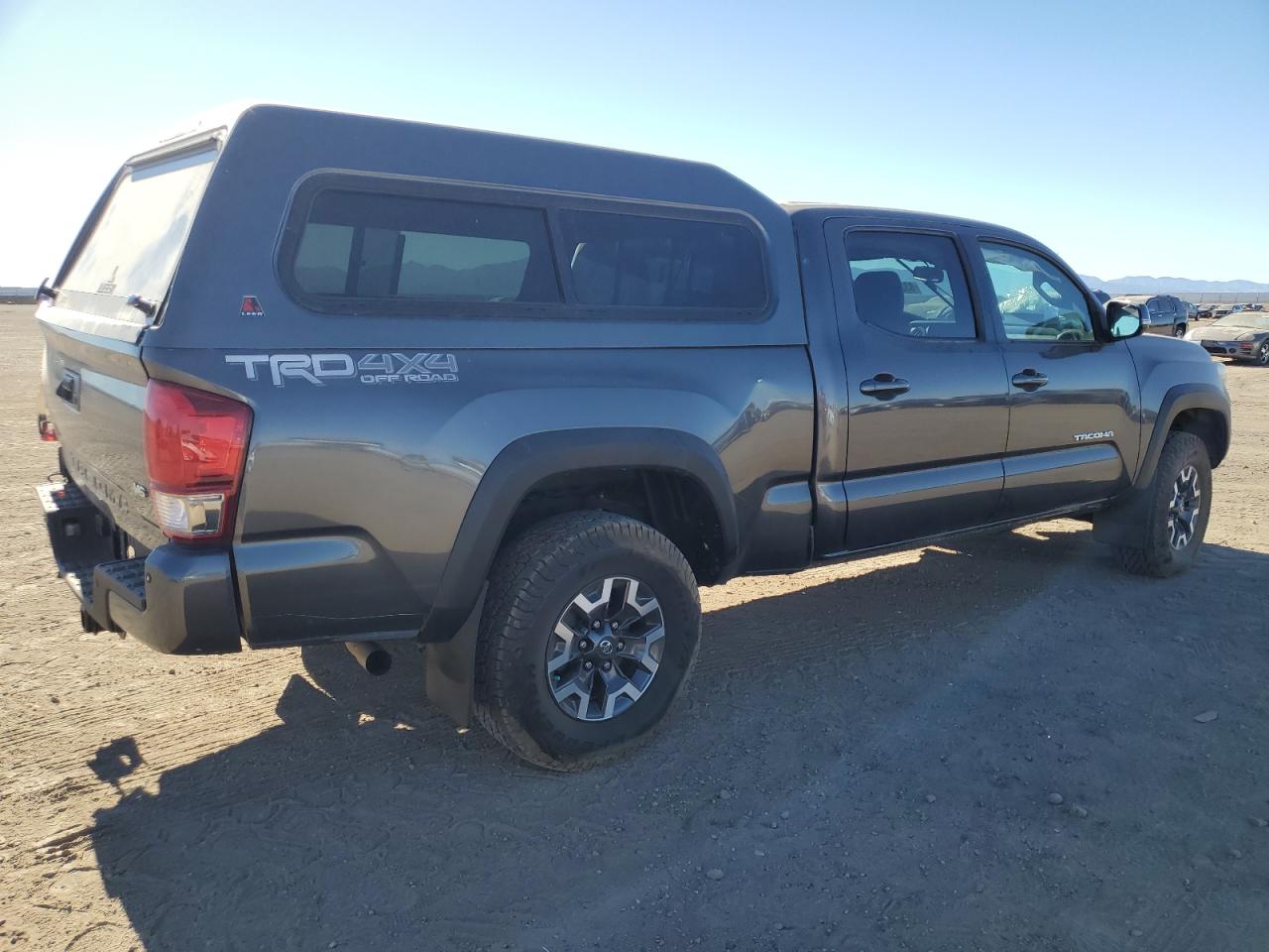 2016 Toyota Tacoma VIN 3TMDZ5BN8GM010943 Copart auction photo, all over damage thumbnail 3