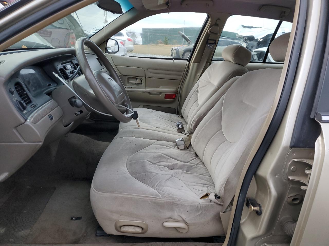 1999 Ford Crown Victoria VIN 2FAFP73W4XX137040 Copart auction photo, all over damage thumbnail 7