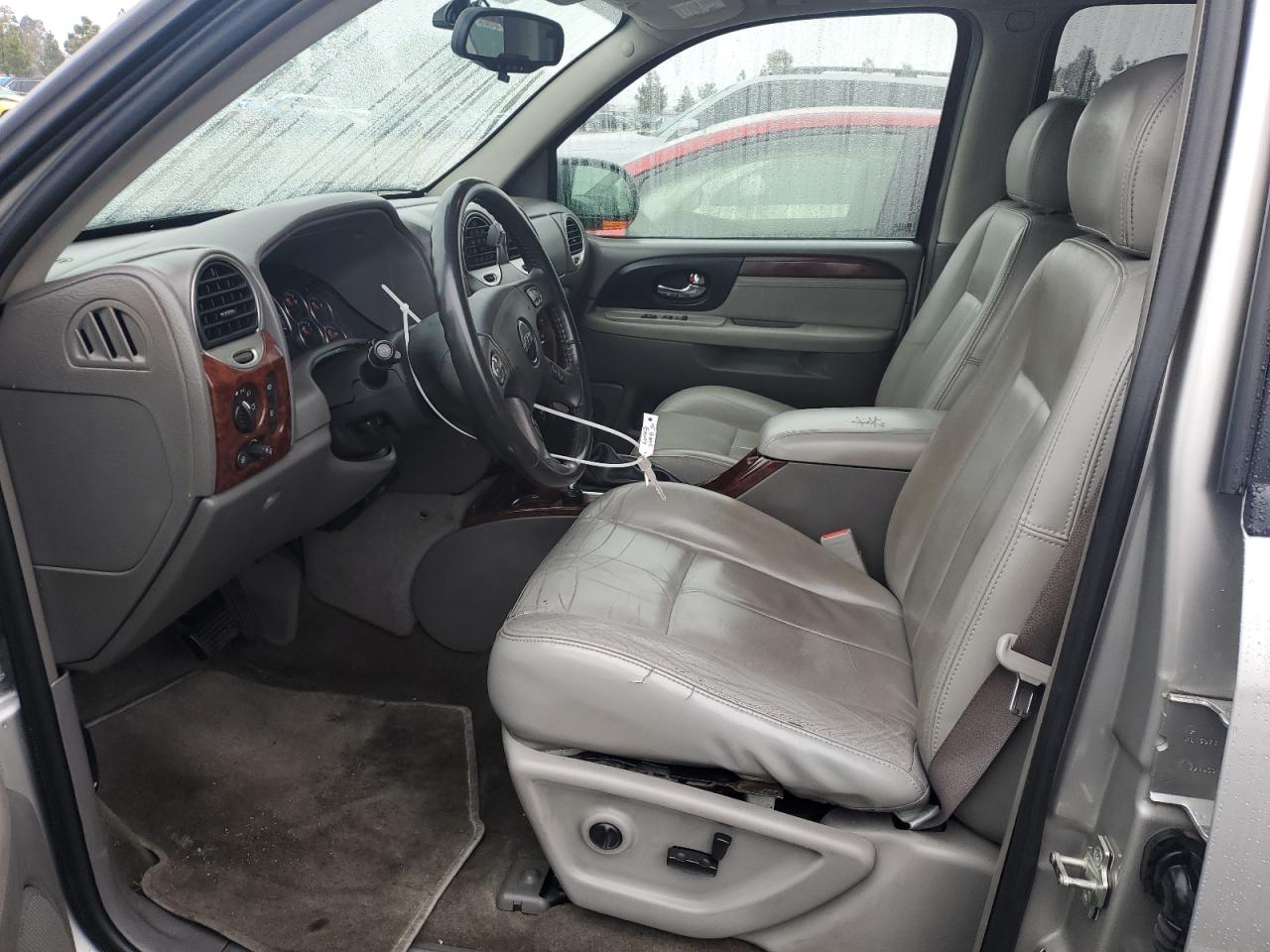 2005 GMC Envoy VIN 1GKES16SX56135283 Copart auction photo, vandalism damage thumbnail 7