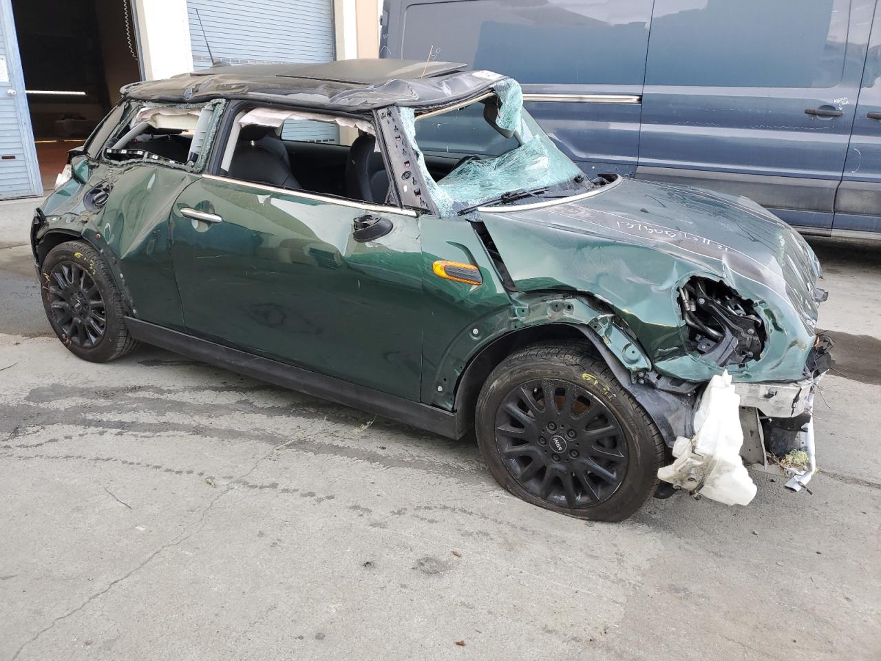 2014 MINI Cooper VIN WMWXM5C55ET932706 Copart auction photo, all over / rollover damage thumbnail 4