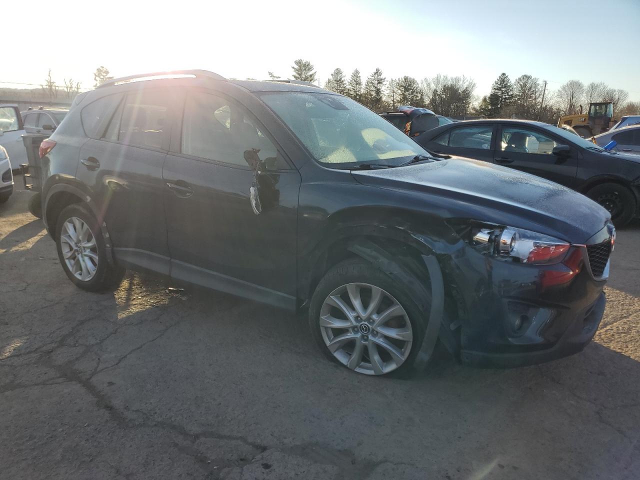2015 Mazda CX-5 VIN JM3KE4DY9F0474952 Copart auction photo, front end damage thumbnail 4