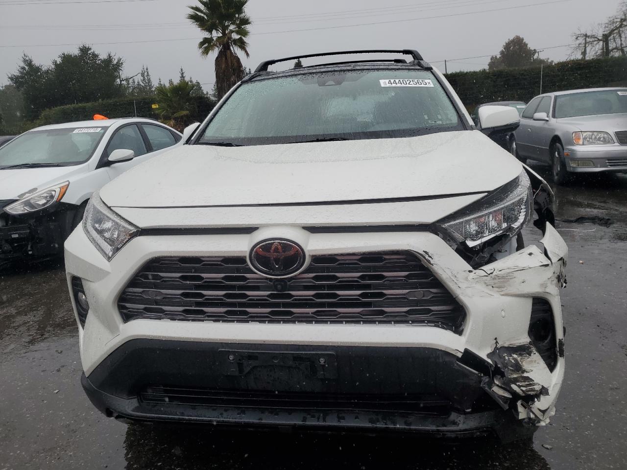 2019 Toyota RAV 4 VIN JTMY1RFV0KJ014534 Copart auction photo, all over damage thumbnail 5