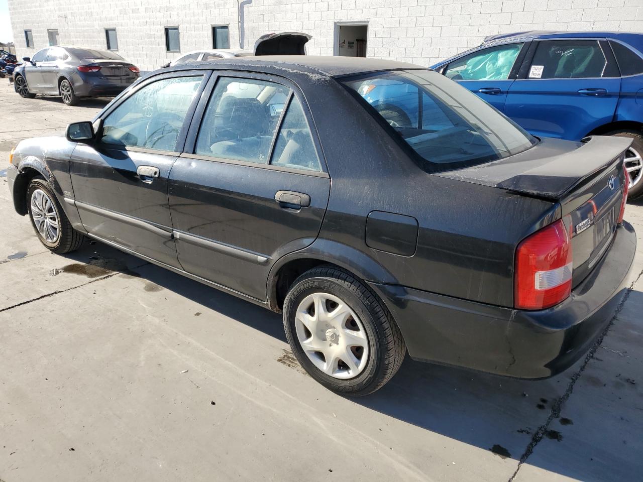 2000 Mazda Protege VIN JM1BJ2220Y0239835 Copart auction photo, front end / all over damage thumbnail 2