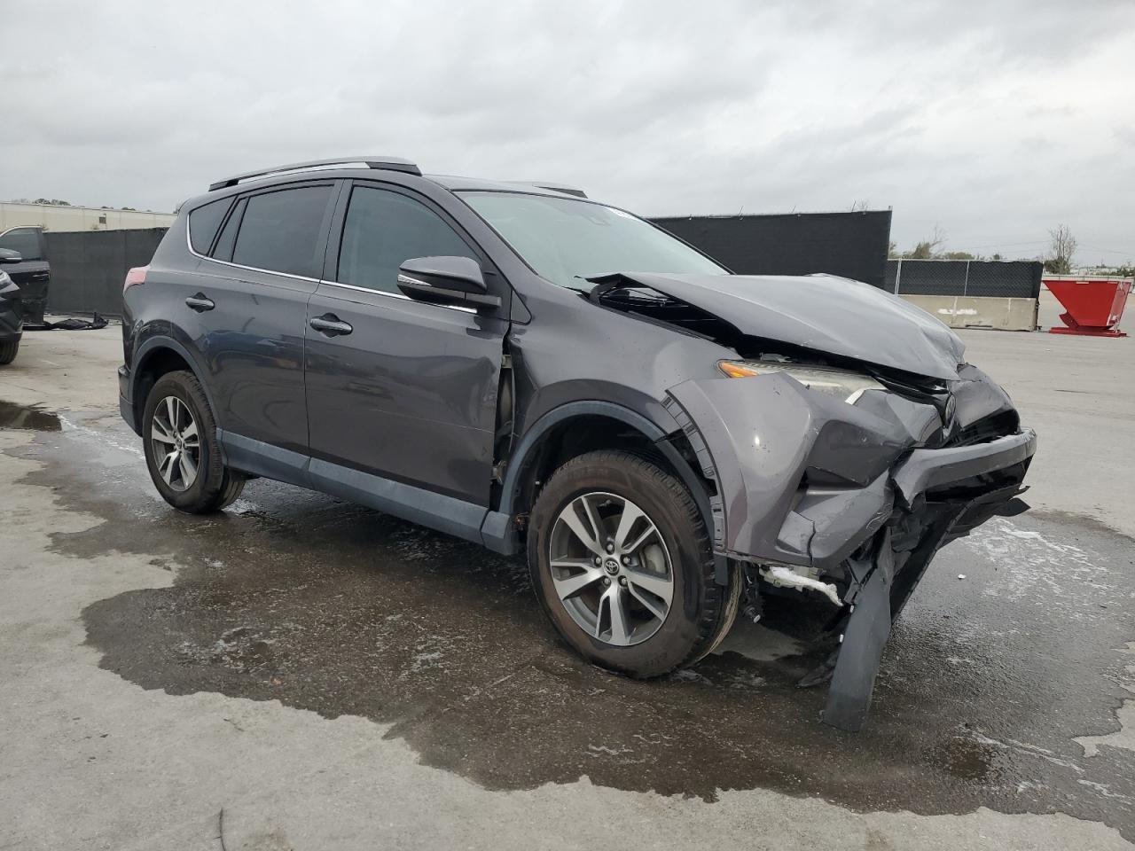 2018 Toyota RAV 4 VIN 2T3WFREVXJW441441 Copart auction photo, front end / side damage thumbnail 4