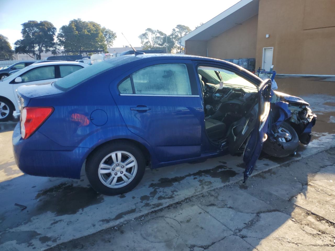 2014 Chevrolet Sonic VIN 1G1JC5SG7E4109079 Copart auction photo, undercarriage / all over damage thumbnail 3