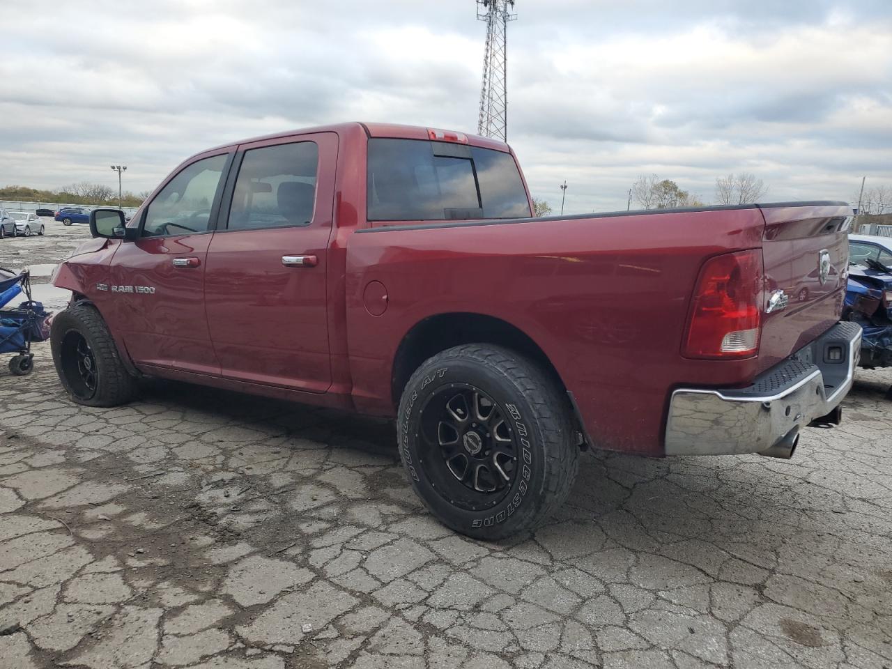 2011 Dodge RAM VIN 1D7RV1CT1BS597922 Copart auction photo, front end / side damage thumbnail 2