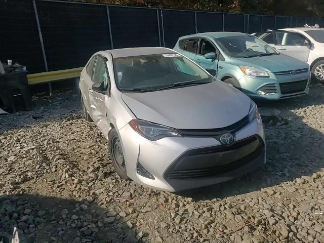 2018 Toyota Corolla VIN 5YFBURHE2JP800050 Copart auction photo, side damage thumbnail 10