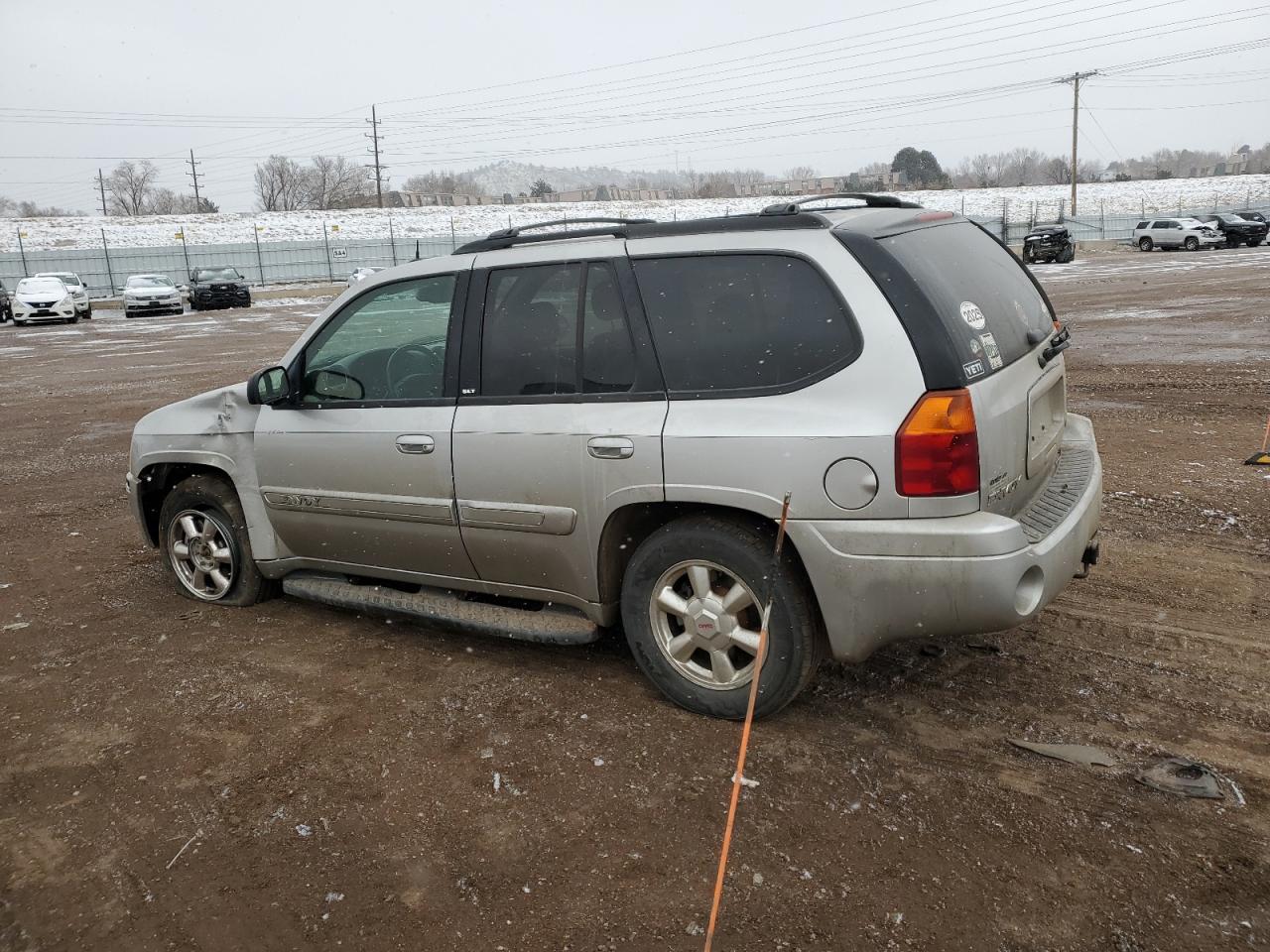 2004 GMC Envoy VIN 1GKDT13S642326590 Copart auction photo, front end / undercarriage damage thumbnail 2