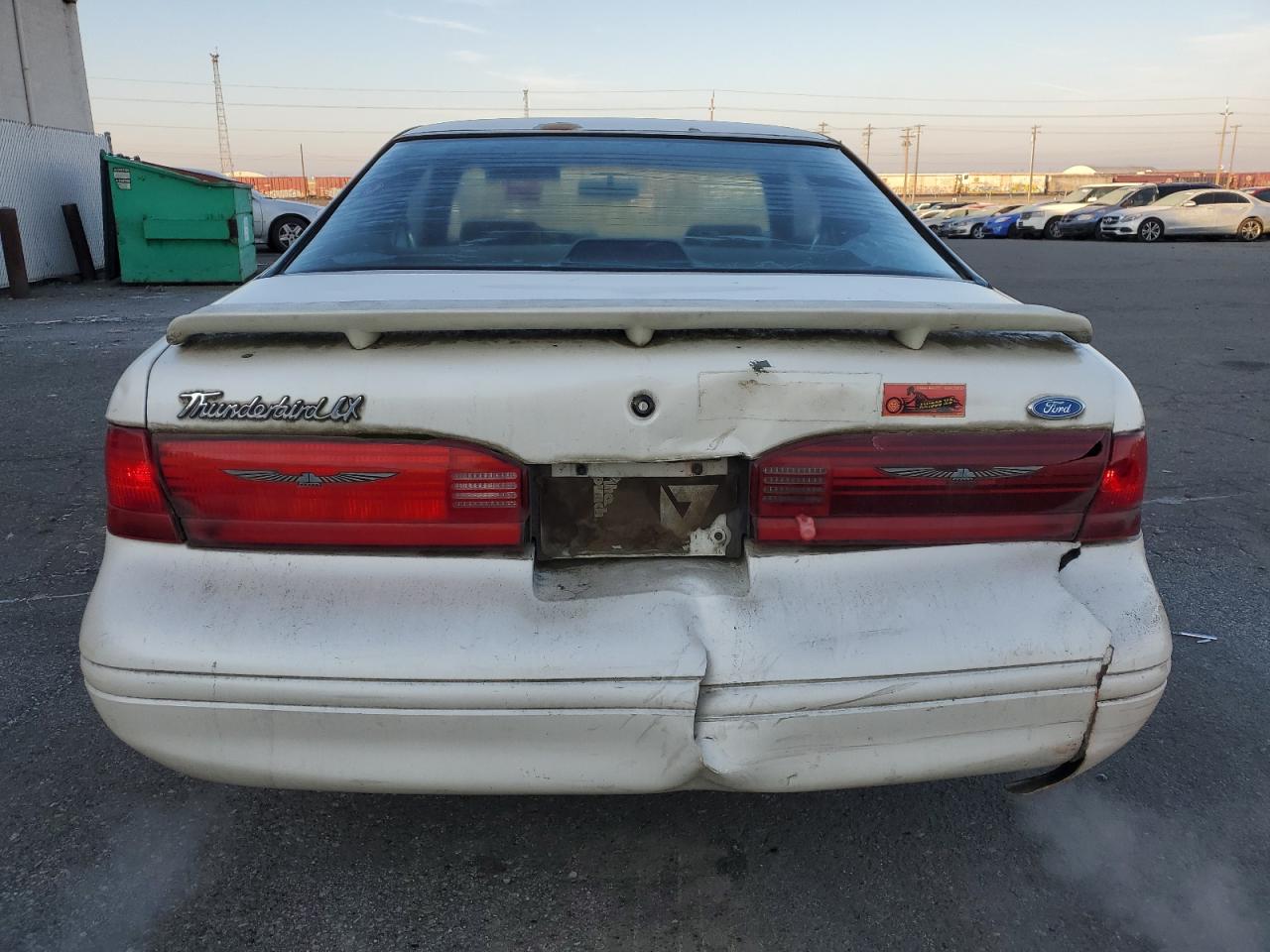 1996 Ford Thunderbird VIN 1FALP62W0TH162431 Copart auction photo, rear end damage thumbnail 6