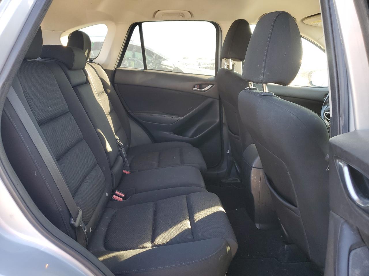 2016 Mazda CX-5 VIN JM3KE2CY3G0801160 Copart auction photo, rear end / minor dent/scratches damage thumbnail 11