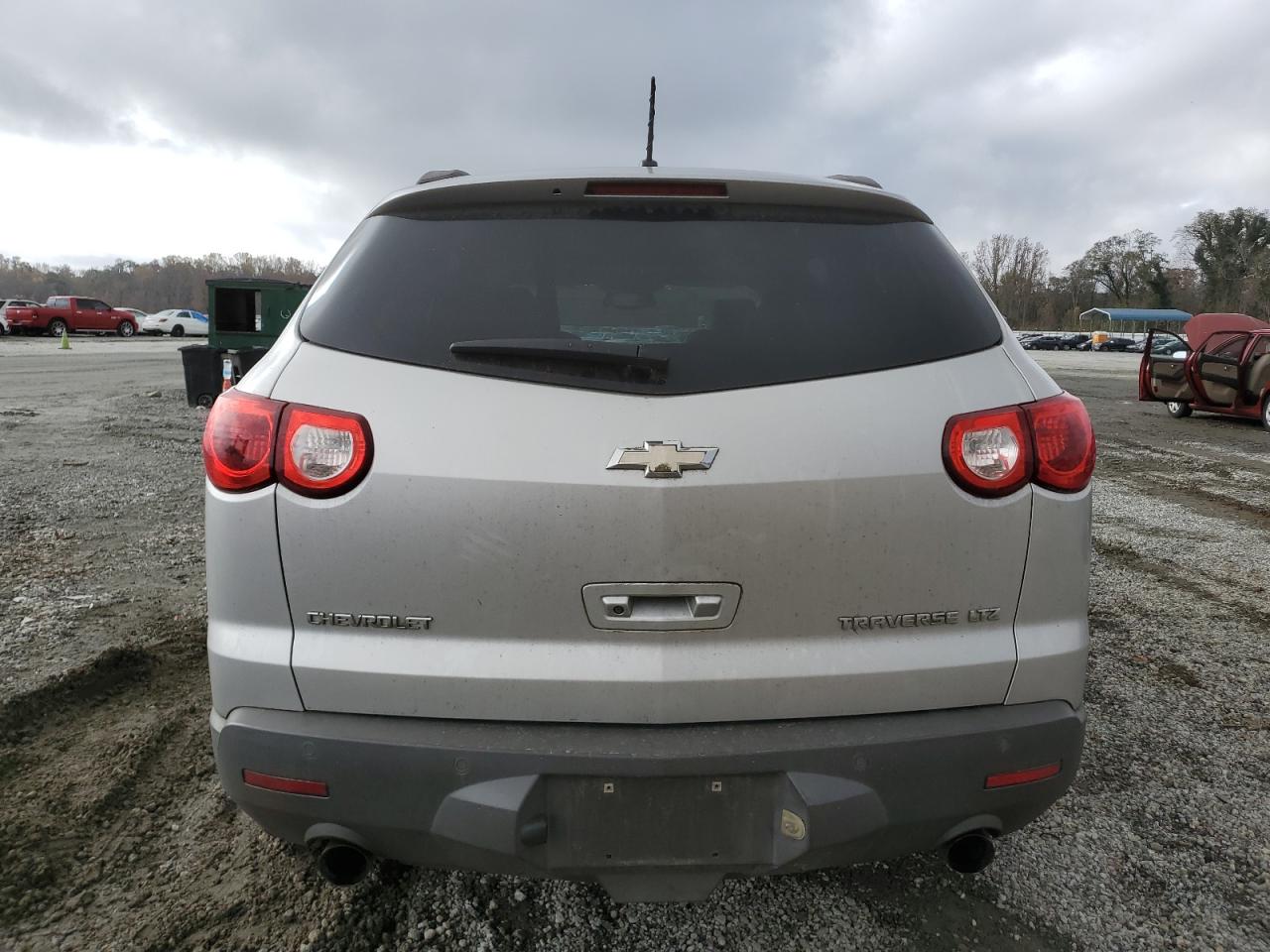 2009 Chevrolet Traverse VIN 1GNER33D39S113512 Copart auction photo, front end damage thumbnail 6