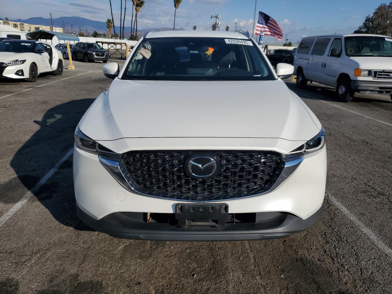 2022 Mazda CX-5 VIN JM3KFBBM9N0565526 Copart auction photo, rear end / minor dent/scratches damage thumbnail 5