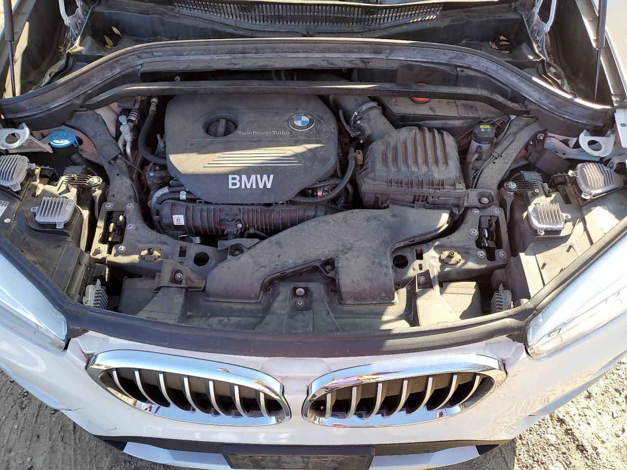2017 BMW X1 VIN WBXHT3C32H5F77716 Copart auction photo, undercarriage / minor dent/scratches damage thumbnail 12