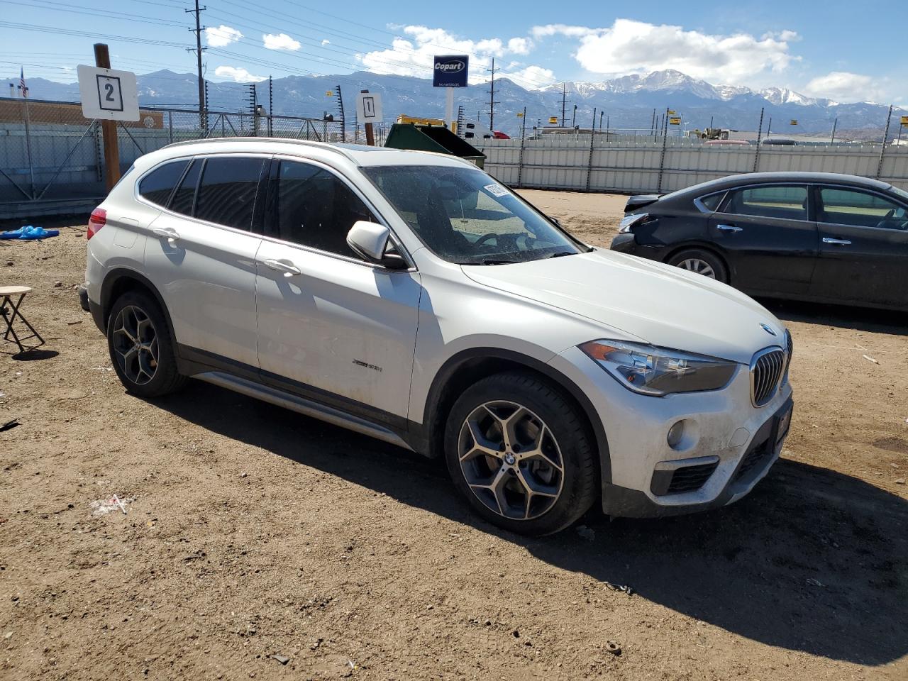 2018 BMW X1 VIN WBXHT3C35J5K29010 Copart auction photo, minor dent/scratches damage thumbnail 4
