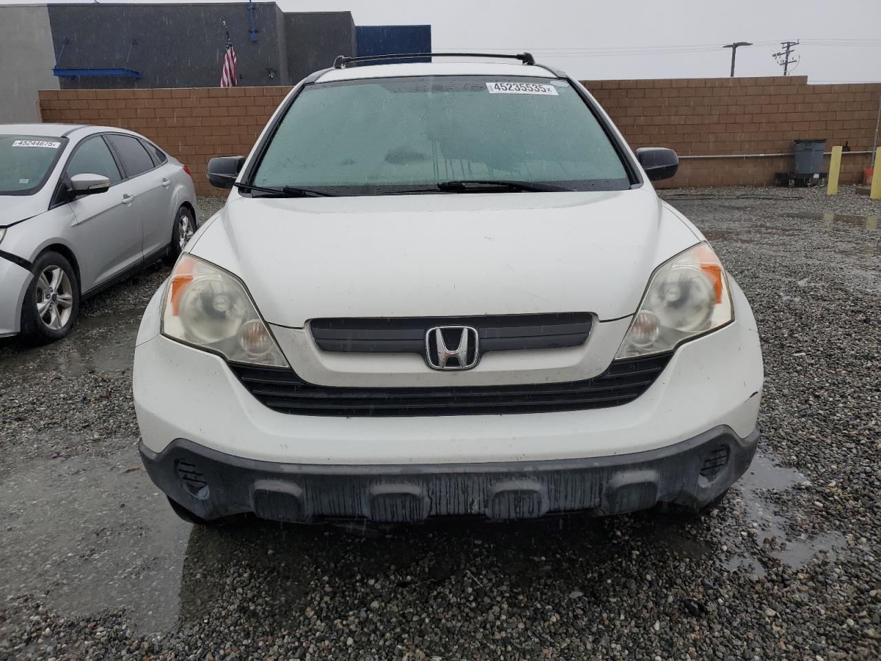 2007 Honda CR-V VIN JHLRE38317C055903 Copart auction photo, minor dent/scratches damage thumbnail 5