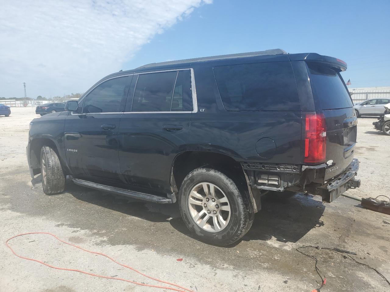 2015 Chevrolet Tahoe VIN 1GNSKBKC0FR593649 Copart auction photo, rear end damage thumbnail 2