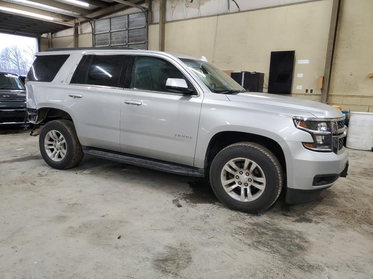 2017 Chevrolet Tahoe VIN 1GNSKBKC1HR256748 Copart auction photo, rear end / minor dent/scratches damage thumbnail 4