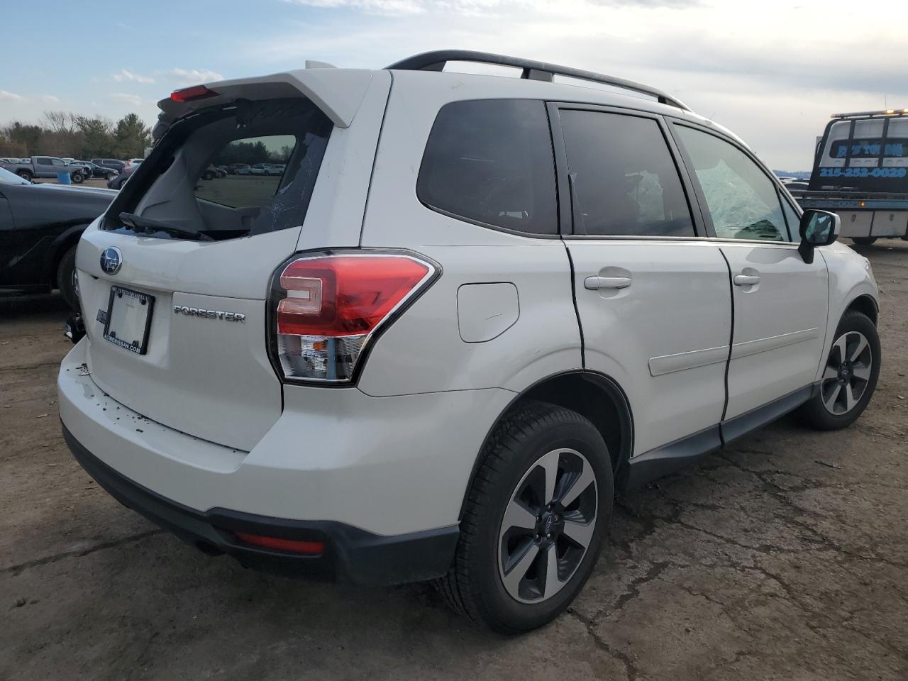 2018 Subaru Forester VIN JF2SJAGC4JH613612 Copart auction photo, front end / top/roof damage thumbnail 3