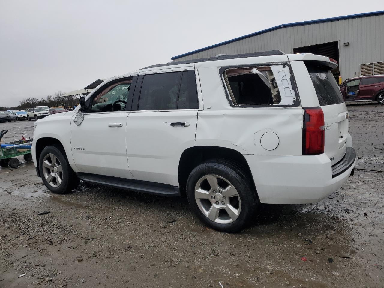 2017 Chevrolet Tahoe VIN 1GNSCBKCXHR282536 Copart auction photo, rollover damage thumbnail 2