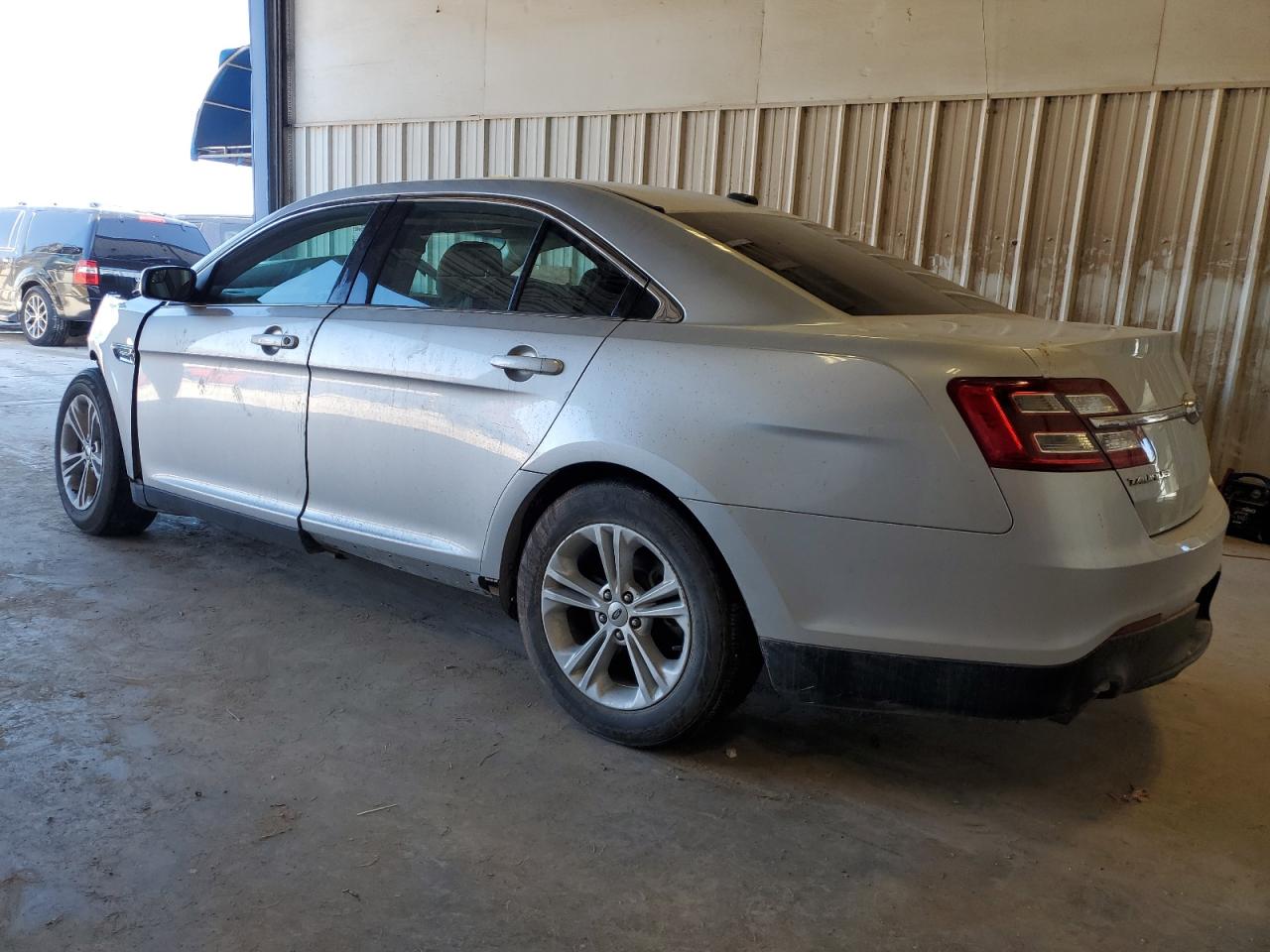 2016 Ford Taurus VIN 1FAHP2D89GG105301 Copart auction photo, front end / hail damage thumbnail 2